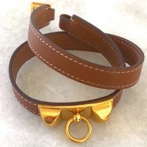 Hermés Double Tour Bracelet in Gold
x Brown Rivale Stud Bracelet